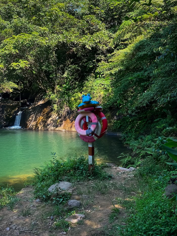 Life preserver ring on a stick near Huiyao Waterfall in Taiwan for safety purposes